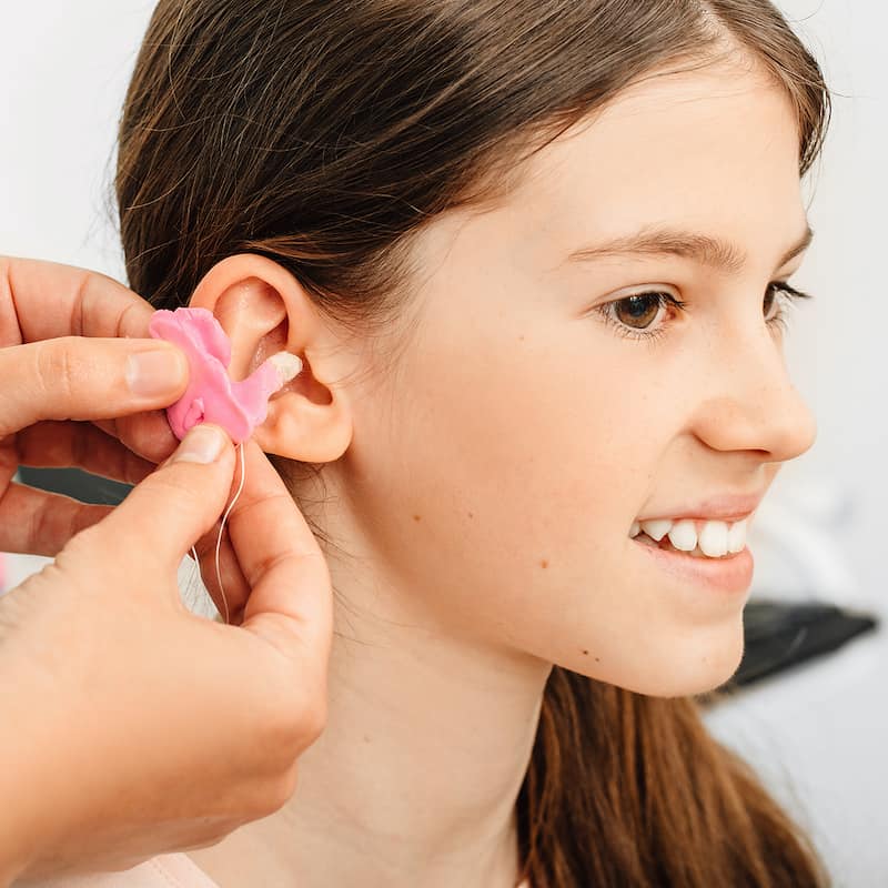 Process Of Making Earplugs From An Impression Of An Individual Child Ear