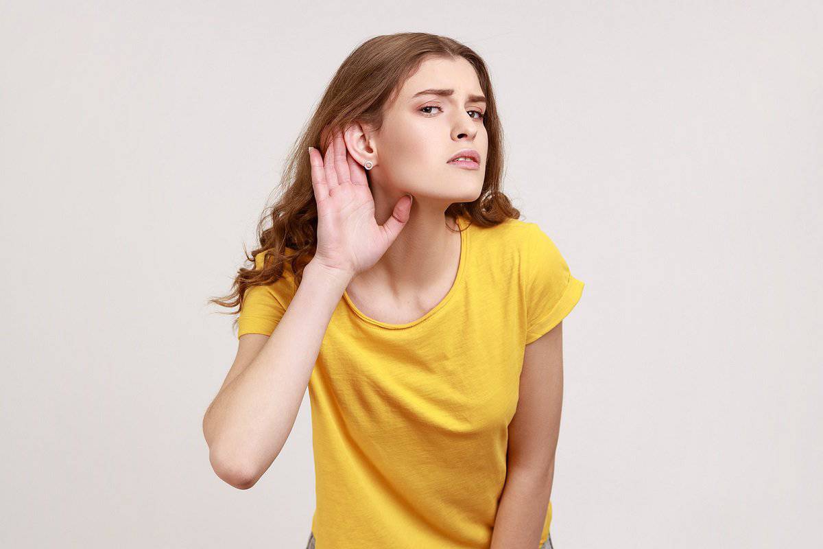 What. I Cant Hear. Portrait Of Girl In Yellow T-shirt Holding Ha